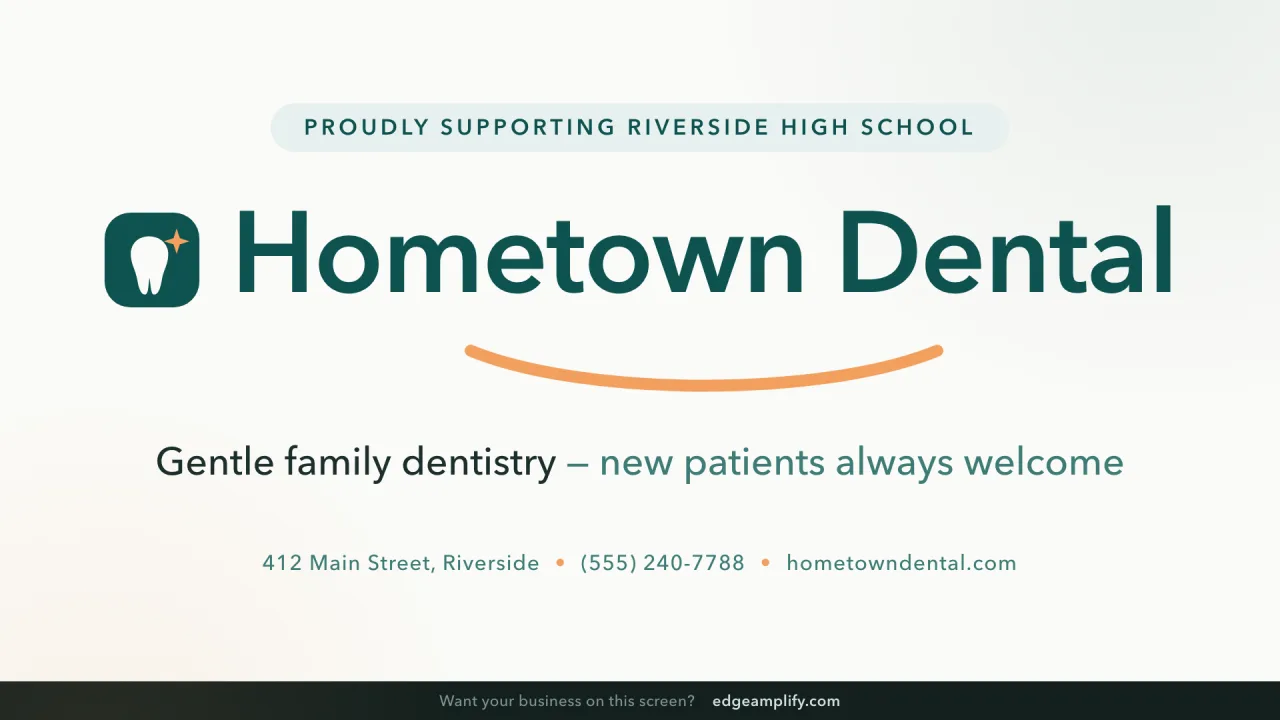 Hallway screen showing a Hometown Dental sponsor spotlight for Riverside High School